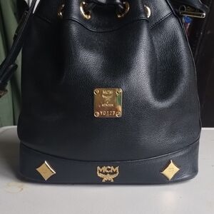 MCM Black Backpack with Gold Accents